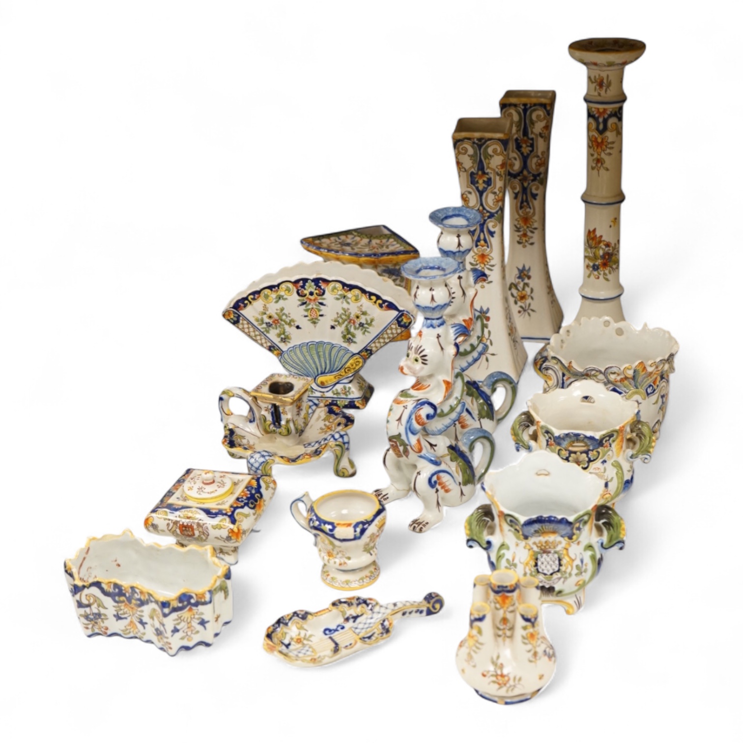 A collection of early 20th century French faience pieces, tallest 37cm